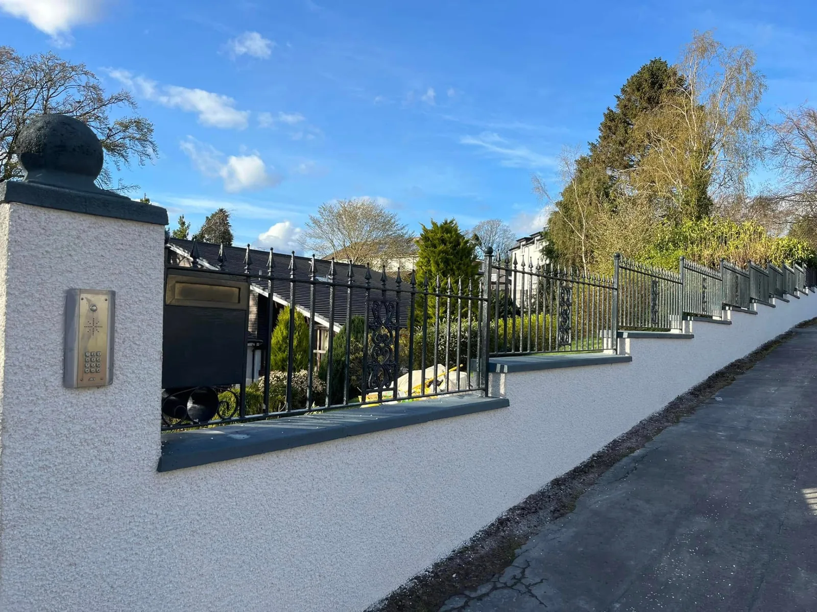 Boundary wall after a fresh exterior finish